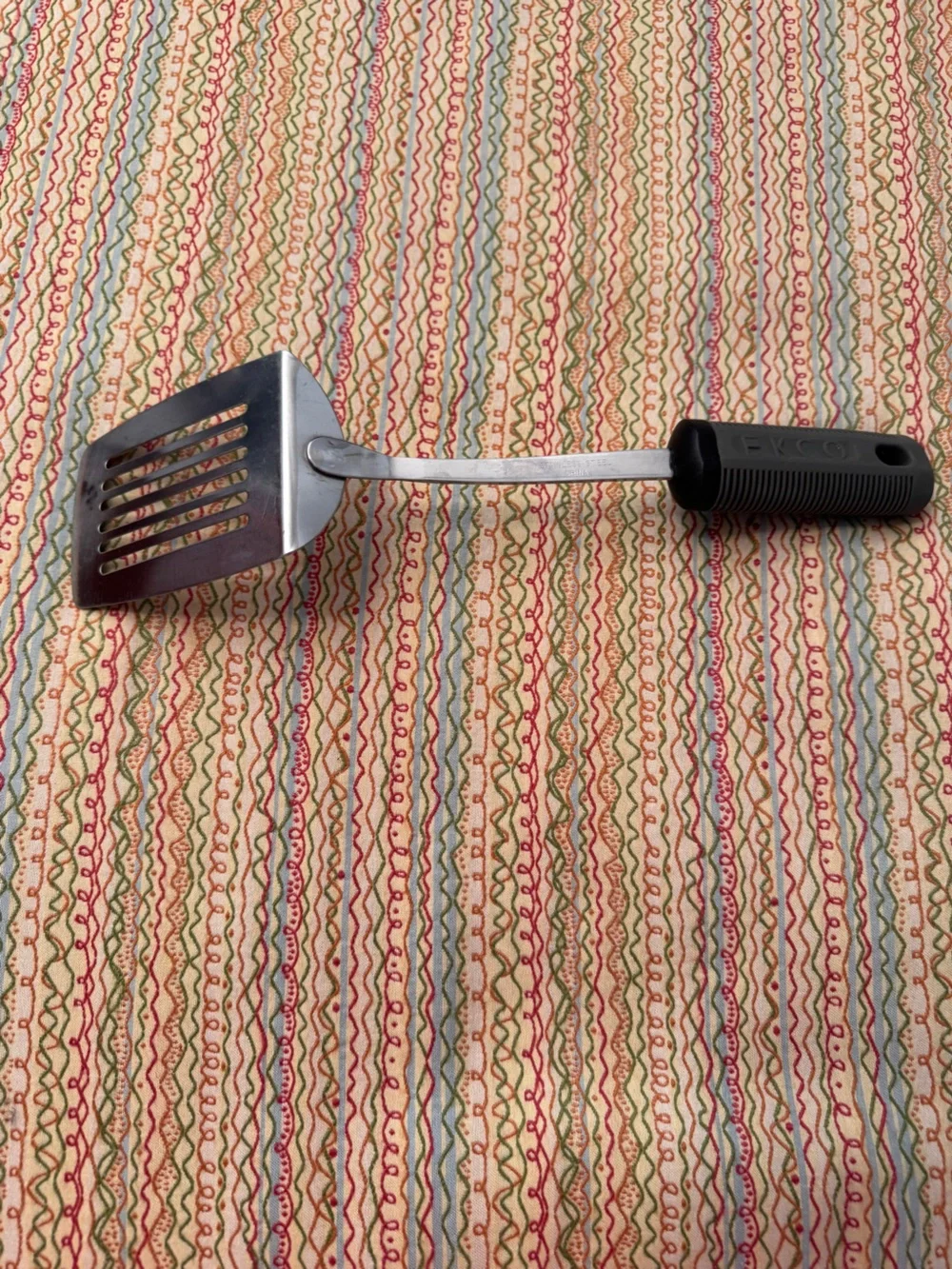 Vintage EKCO slotted spatula stainless steel blade and black rubber grip handle
